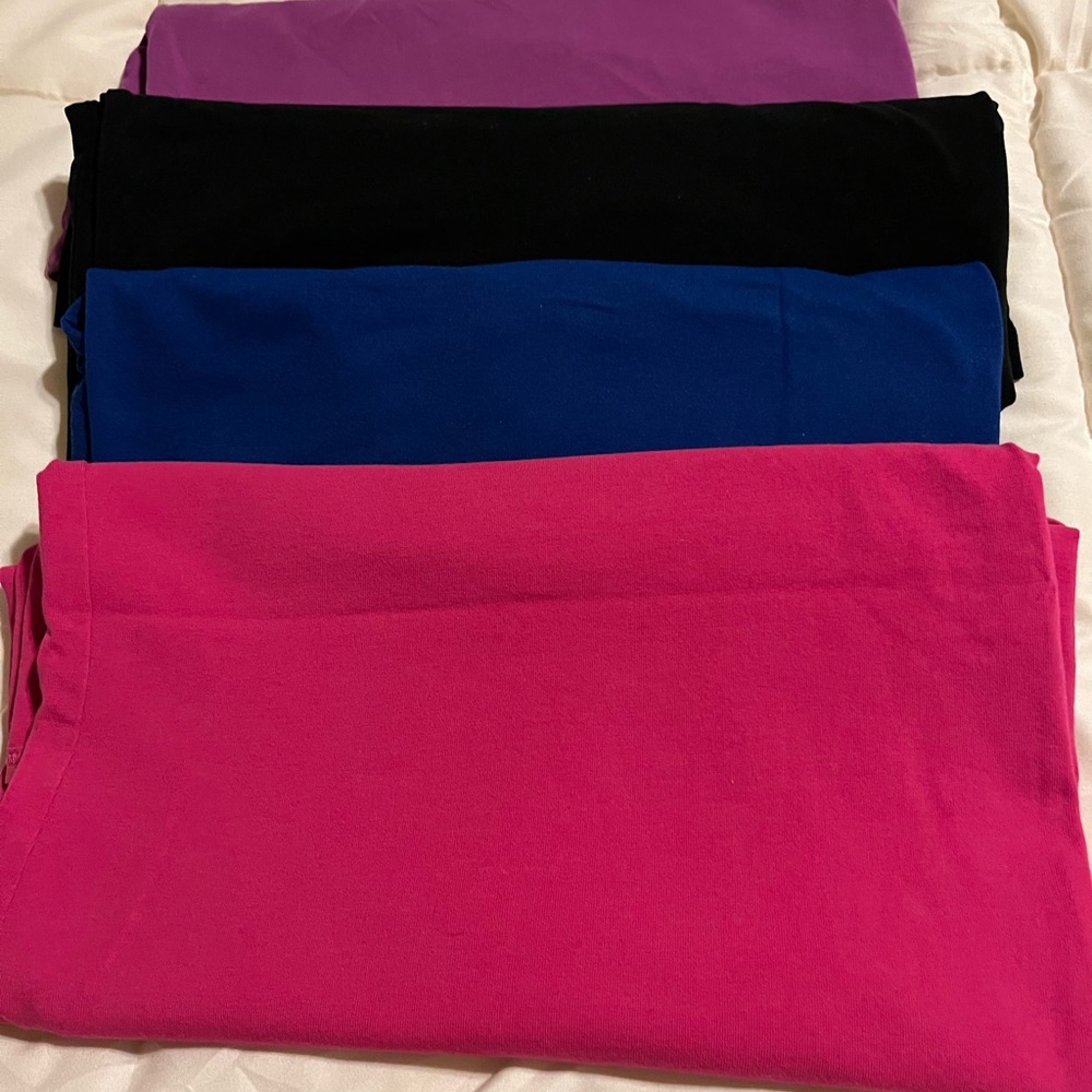4 Different color camisoles in great condition. Sizes 22/24-2X.